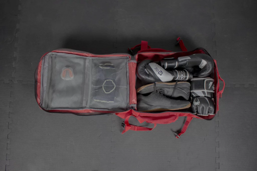 Opened red crossfit gym bag